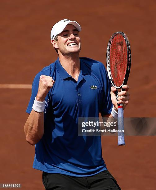 John Isner of the USA celebrates his two-set victory over Nicolas Almagro of Spain during their finals match at the US Men's Clay Court Championships...