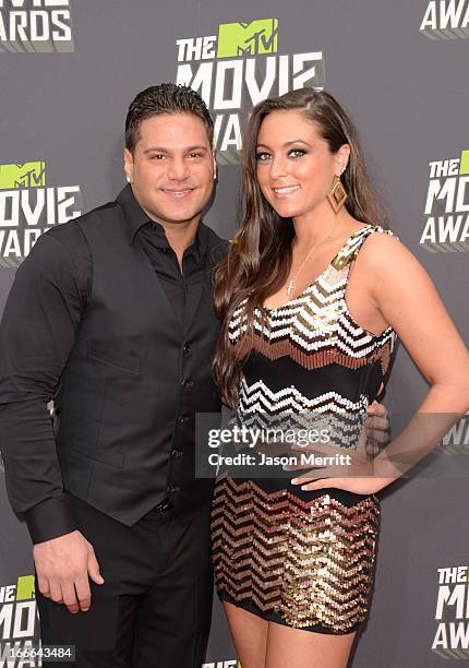 Personalities Ronnie Ortiz-Magro and Sammi Giancola arrive at the 2013 MTV Movie Awards at Sony Pictures Studios on April 14, 2013 in Culver City,...