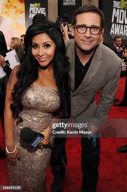 Personality Nicole 'Snooki' Polizzi and actor Steve Carell arrives at the 2013 MTV Movie Awards at Sony Pictures Studios on April 14, 2013 in Culver...