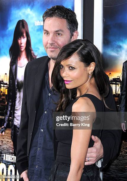 Actress Thandie Newton and husband/writer Ol Parker attend the premiere of 'Rogue' at ArcLight Hollywood on March 26, 2013 in Hollywood, California.