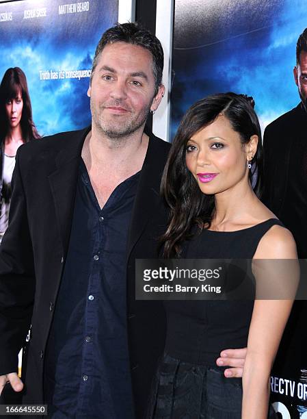 Actress Thandie Newton and husband/writer Ol Parker attend the premiere of 'Rogue' at ArcLight Hollywood on March 26, 2013 in Hollywood, California.