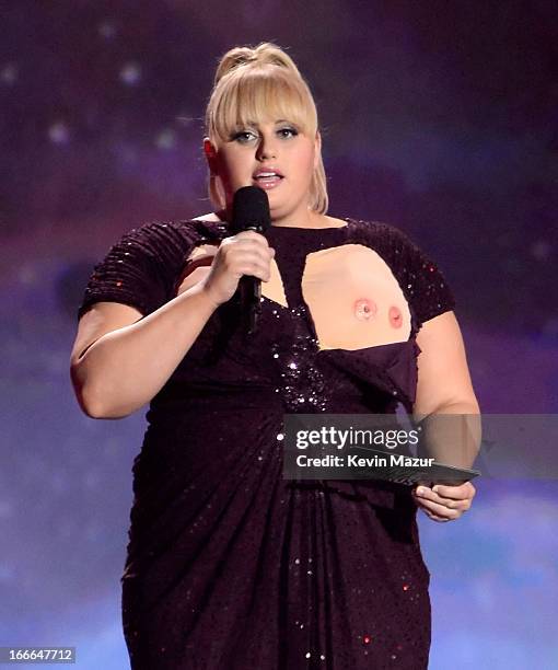 Host Rebel Wilson speaks onstage during the 2013 MTV Movie Awards at Sony Pictures Studios on April 14, 2013 in Culver City, California.