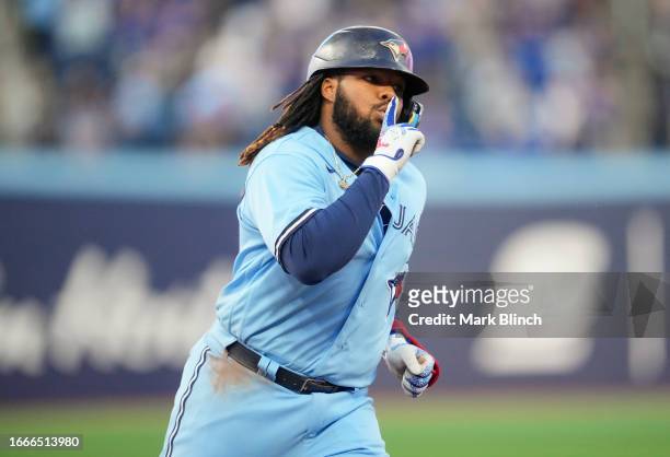 Vladimir Guerrero Jr. #27 of the Toronto Blue Jays celebrates his home run during the first inning against the Texas Rangers at Rogers Centre on...