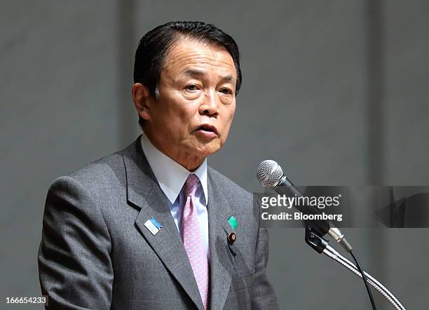 Taro Aso, Japan's deputy prime minister and finance minister, speaks at the annual meeting of the Trust Companies Association of Japan in Tokyo,...