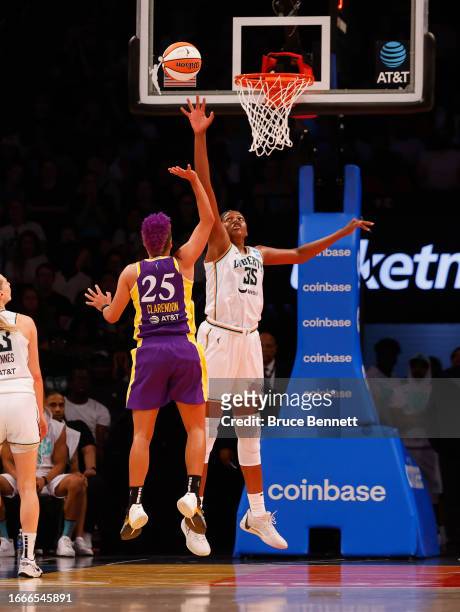 Jonquel Jones of the New York Liberty defends against Layshia Clarendon of the Los Angeles Sparks at the Barclays Center on September 07, 2023 in the...