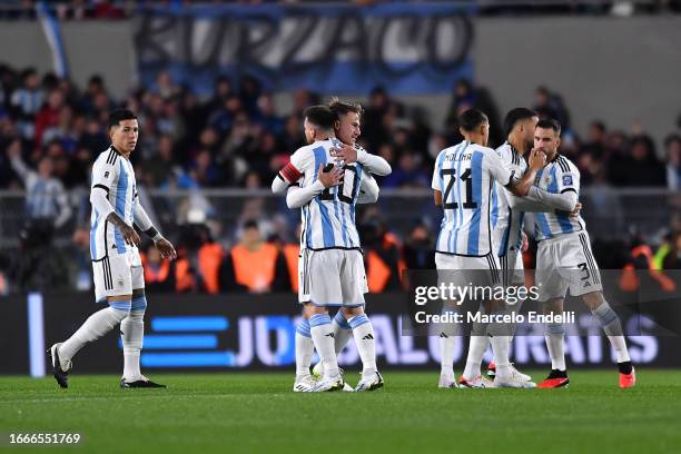 Lionel Messi of Argentina hugs teammate Alexis McAlister during the FIFA World Cup 2026 Qualifier match between Argentina and Ecuador at Estadio Más...