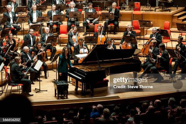 Helene Grimaud performs on stage in concert with the Czech Philharmonic Orchestra at Symphony Hall on April 12, 2013 in Birmingham, England.