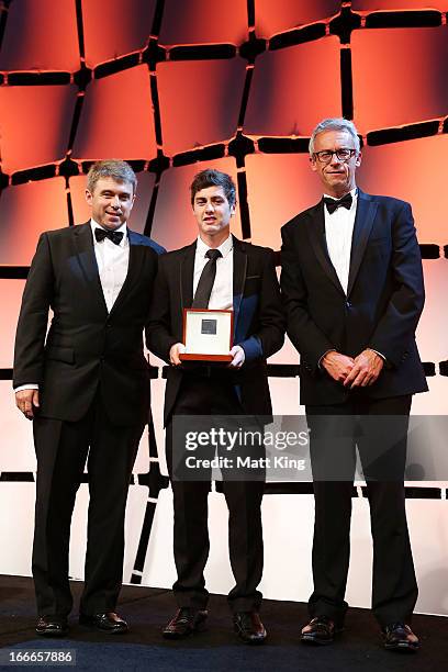 Jamie Warren and FFA CEO David Gallop present Marco Rojas of the Victory with the Johnny Warren Medal as the Hyundai A-League Player of the Year...