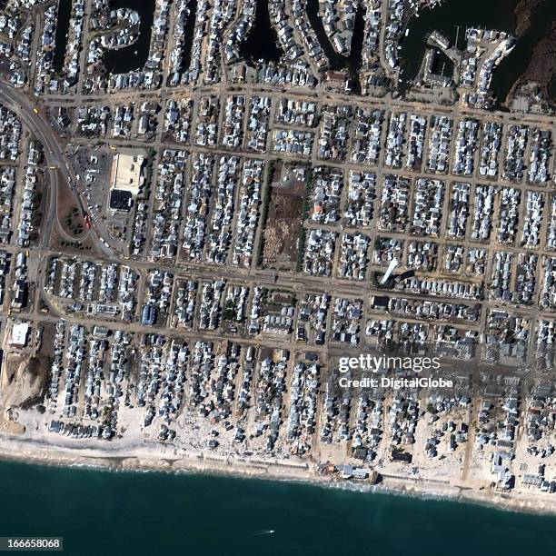 This is a satellite image of Hurricane Sandy damage in Ortley Beach, New Jersey, United States showing damage along the coastline, collected on...