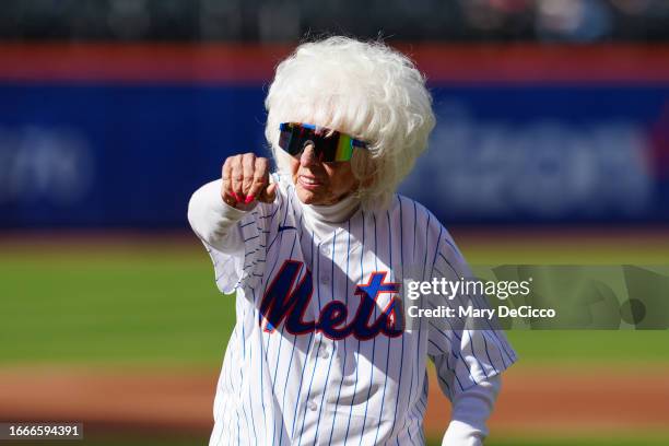 Former All-American Girls Professional Baseball League Peoria Redwings pitcher Maybelle Blair throws out the first pitch prior to the game between...