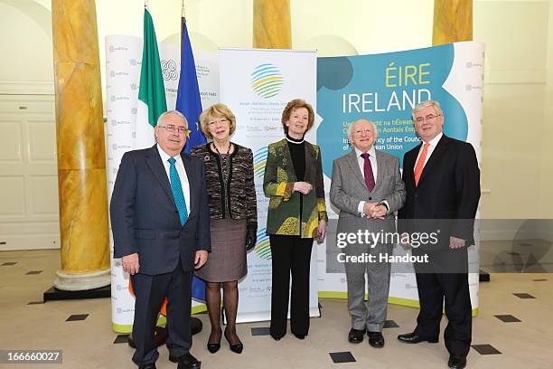 In this handout image provided by the Dept of the Taoiseach, Minister of State for Trade and Development, Joe Costello, Sabina Coyne, Mary Robinson,...