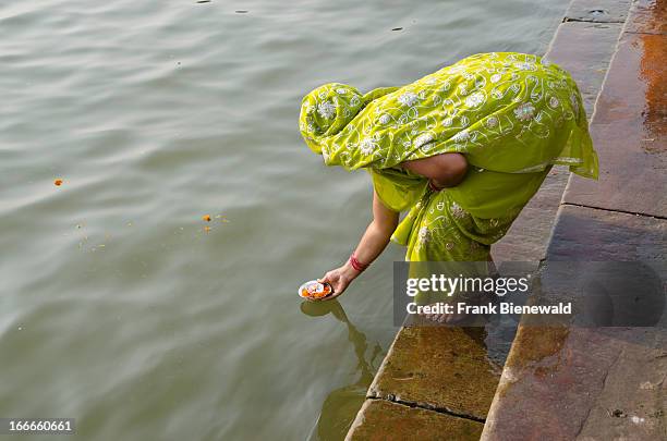 Offerings to the holy river Ganges is part of every pilgrimage to Varanasi..