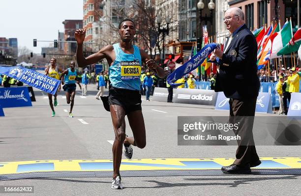 Lelisa Desisa Benti of Ethiopia crosses the finish line to win the men's division of the 117th Boston Marathon on April 15, 2013 in Boston,...