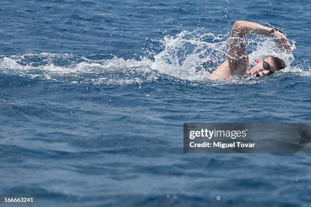 Daniel Fogg of UK competes in the Men's Open Water 10km FINA World Championships at Cozumel Beach on April 13, 2013 in Cozumel, Mexico.