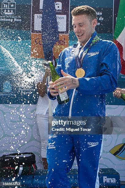 Daniel Fogg of UK celebrates after winning the gold medal in the Men's Open Water 10km FINA World Championships at Cozumel Beach on April 13, 2013 in...