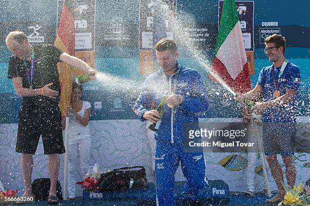 Daniel Fogg of UK celebrates after winning the gold medal in the Men's Open Water 10km FINA World Championships at Cozumel Beach on April 13, 2013 in...