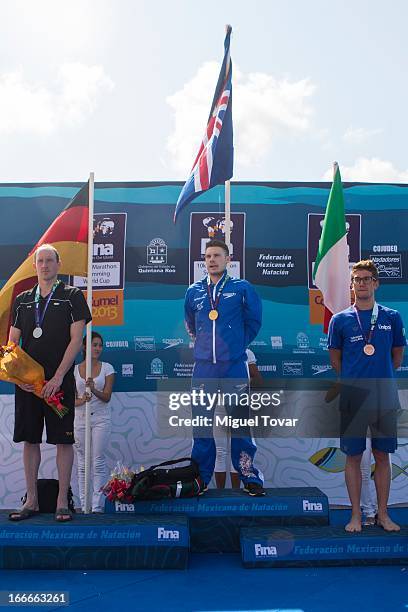 Daniel Fogg of UK receives the gold medal in the Men's Open Water 10km FINA World Championships at Cozumel Beach on April 13, 2013 in Cozumel, Mexico.