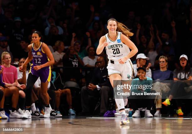 Sabrina Ionescu of the New York Liberty celebrates her fourth quarter three-pointer against the Los Angeles Sparks at the Barclays Center on...