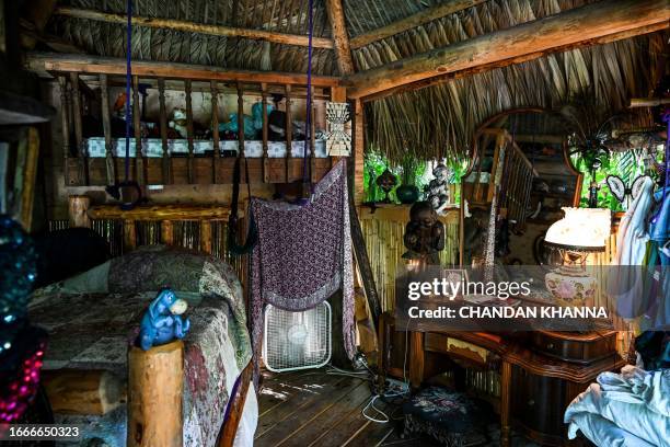 Tiki hut bedroom is seen at the self made tropical house of North Miami resident Shawnee Chasser, in Miami, Florida, on September 12, 2023. Chasser...