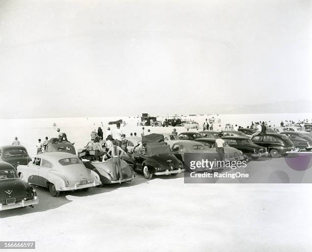 Early-1950s: Spectators clamor for every vantage point possible as they watch Ab Jenkins during speed trials on the Bonneville Salt Flats.