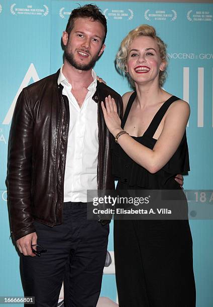 Actress Marina Rocco and fiance Paolo Stella attend 'Nina' premiere at Cinema Barberini on April 15, 2013 in Rome, Italy.