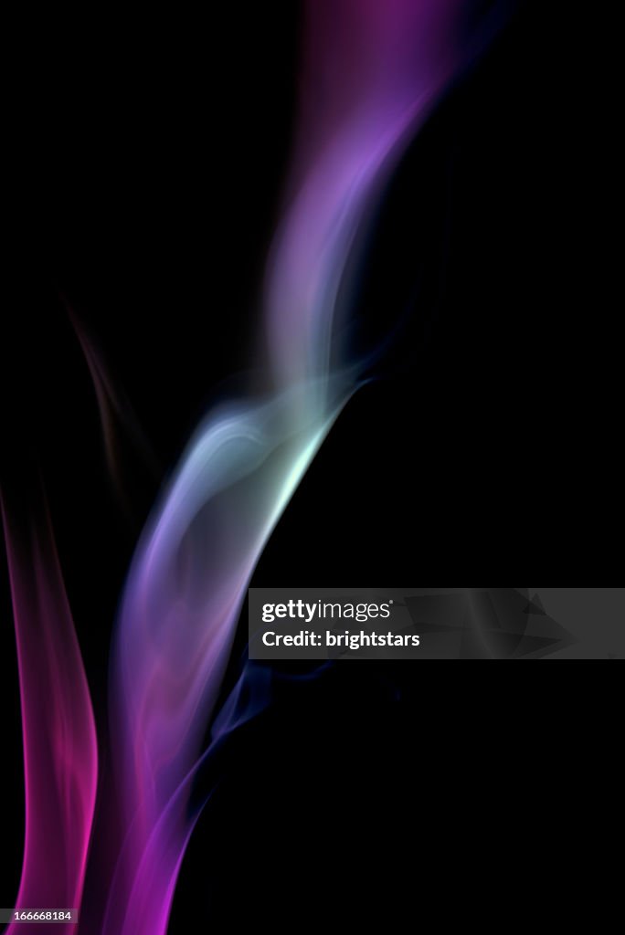 Purple smoke on a black background