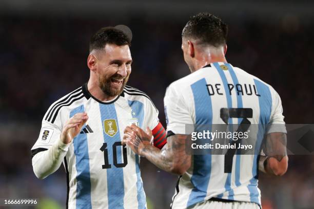 Lionel Messi of Argentina celebrates with teammate Rodrigo De Paul after scoring the team's first goal during the FIFA World Cup 2026 Qualifier match...