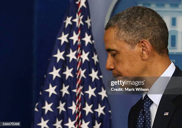 President Barack Obama walks away after speaking about today's bombing at the Boston Marathon, April 15, 2013 in Washington, DC. Two people are...