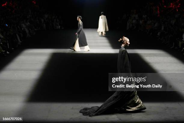 Models walk the runway at MISUITY collection show by designer GAOTIAN on day one of the China Fashion Week S/S 2024 at Beijing Hotel on September 7,...