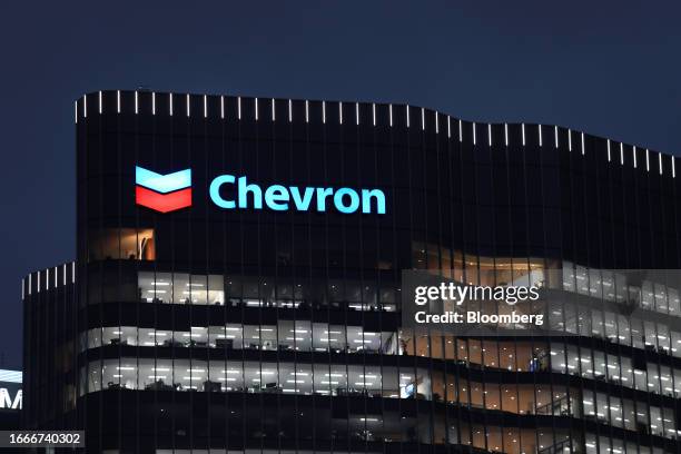 The Chevron Corp. Logo atop One The Esplanade office tower, which houses the company's office, in Perth, Australia, on Thursday, Sept. 14, 2023....