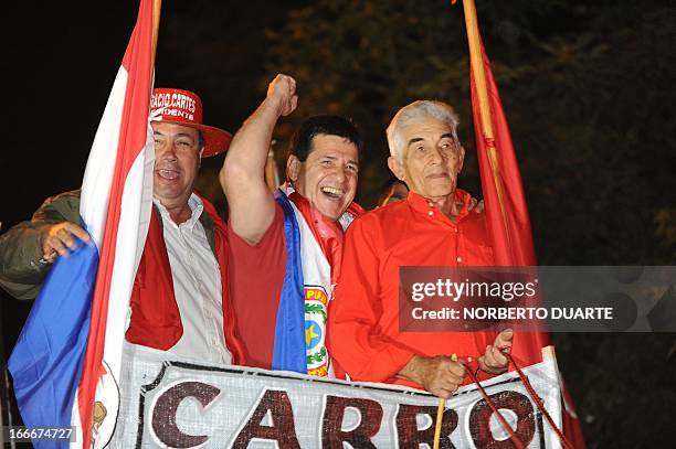 Paraguayan presidential candidate for the Colorado party, Horacio Cartes , attends a rally in Limpio, in the outskirts of Asuncion on April 15, 2013....