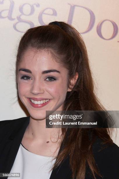 Actress Alice Isaaz poses during the premiere of the movie "La Cage Doree" at Cinema Gaumont Marignan on April 15, 2013 in Paris, France.
