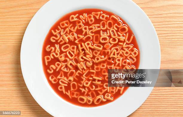 close up of alphabetic spaghetti - soup stock pictures, royalty-free photos & images