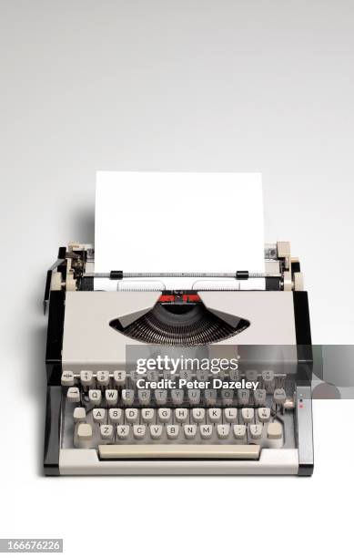 retro type writer with copy space - typewriter stock-fotos und bilder