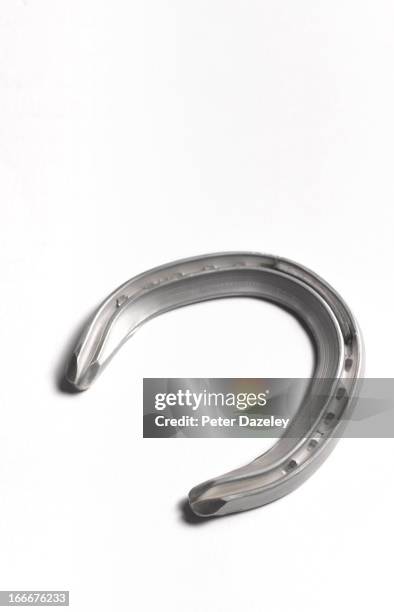 racing horse shoe with copy space - horseshoe isolated stock pictures, royalty-free photos & images