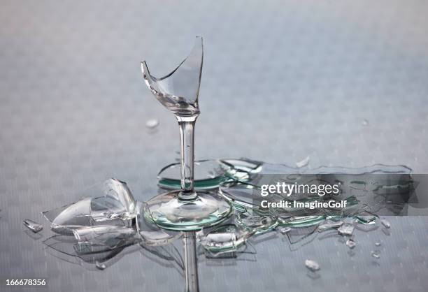 broken glass and alcoholic drink alcoholism concept - broken drinking glass stock pictures, royalty-free photos & images