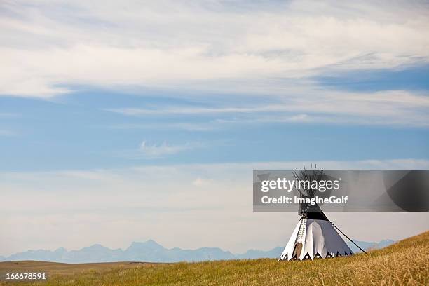 tipi on the great plains - alberta prairie stock pictures, royalty-free photos & images