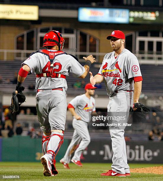 Mitchell Boggs of the St. Louis Cardinals celebrates after pitching in the ninth inning against the Pittsburgh Pirates during the game on April 15,...