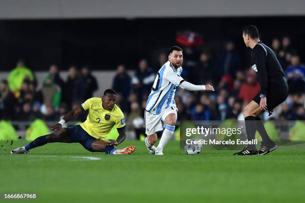 Lionel Messi of Argentina avoids a tackle from Felix Torres of Ecuador during the FIFA World Cup 2026 Qualifier match between Argentina and Ecuador...