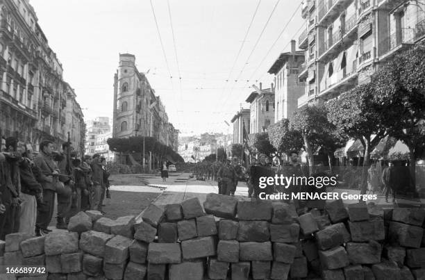 The Barricades. Alger- 2 février 1960- Les émeutes d'Alger: ici, rue Charles Peguy, reddition du camp retranché des insurgés, Pierre Lagaillarde...