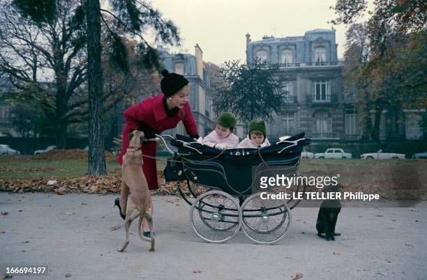 Close-Up Of Genevieve Page. Paris - 10 octobre 1963 - Sur une avenue du XVIe arrondissement, lors d'une promenade, Geneviève PAGE portant un manteau...