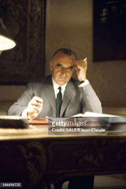 Georges Pompidou At Matignon. Le Premier ministre Georges POMPIDOU travaillant le soir à son bureau, à l'hôtel Matignon, durant les évènements de mai...