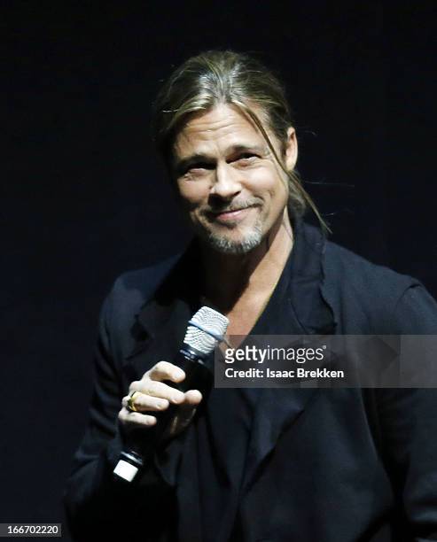 Actor Brad Pitt speaks at a Paramount Pictures presentation to promote his upcoming film, "World War Z" during CinemaCon at The Colosseum at Caesars...