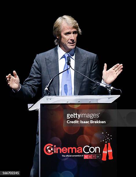 Director Michael Bay speaks at a Paramount Pictures presentation to promote his upcoming film, "Pain & Gain" during CinemaCon at The Colosseum at...