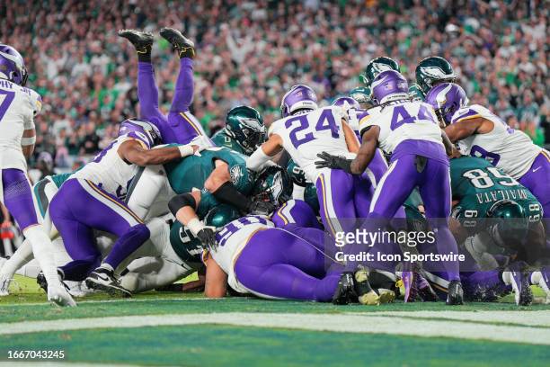 Philadelphia Eagles quarterback Jalen Hurts scores on a tush push play during the game between the Minnesota Vikings and the Philadelphia Eagles on...