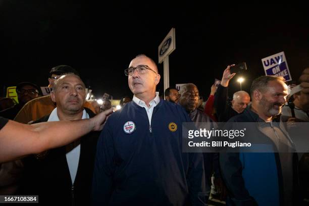 United Auto Workers President Shawn Fain joins UAW members as they go on strike at the Ford Michigan Assembly Plant on September 15, 2023 in Wayne,...