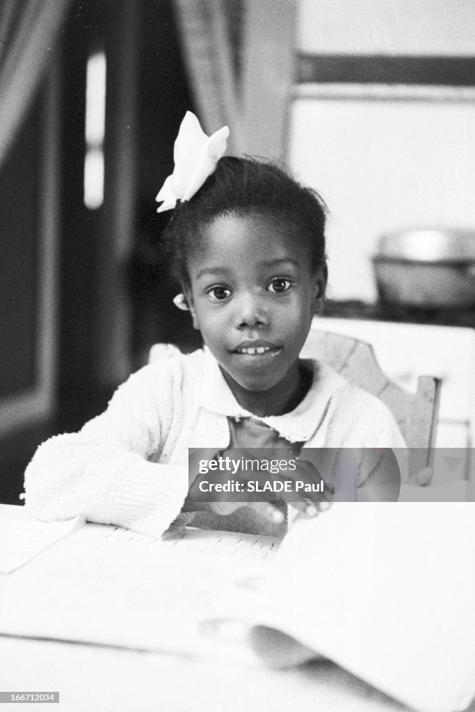Ruby Brig Ruby Bridges, 6 years old, sitting at a table in a kitchen, New... News ...
