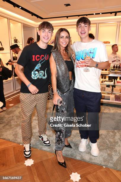 Sylwia Klose with her sons Noah Klose and, Luan Klose during the Gucci Munich flagship store opening cocktail 2023 on September 14, 2023 in Munich,...