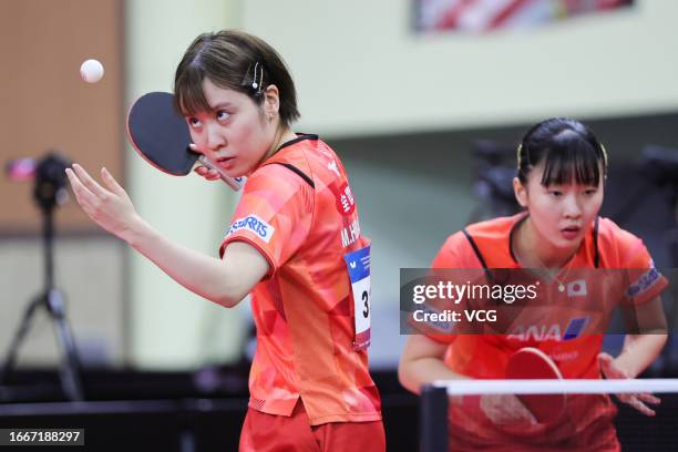 Miu Hirano and Miwa Harimoto of Team Japan compete in the Women's Doubles quarter-final match against Sun Yingsha and Wang Yidi of Team China on day...