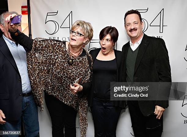 Actor Tom Hanks poses backstage following Rita Wilson's performance at 54 Below on April 15, 2013 in New York City.